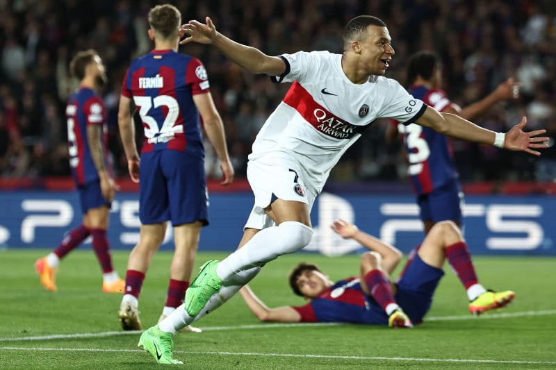 Mbappé foi autor de dois gols na vitória francesa sobre o Barcelona por 4 a 2, na Espanha